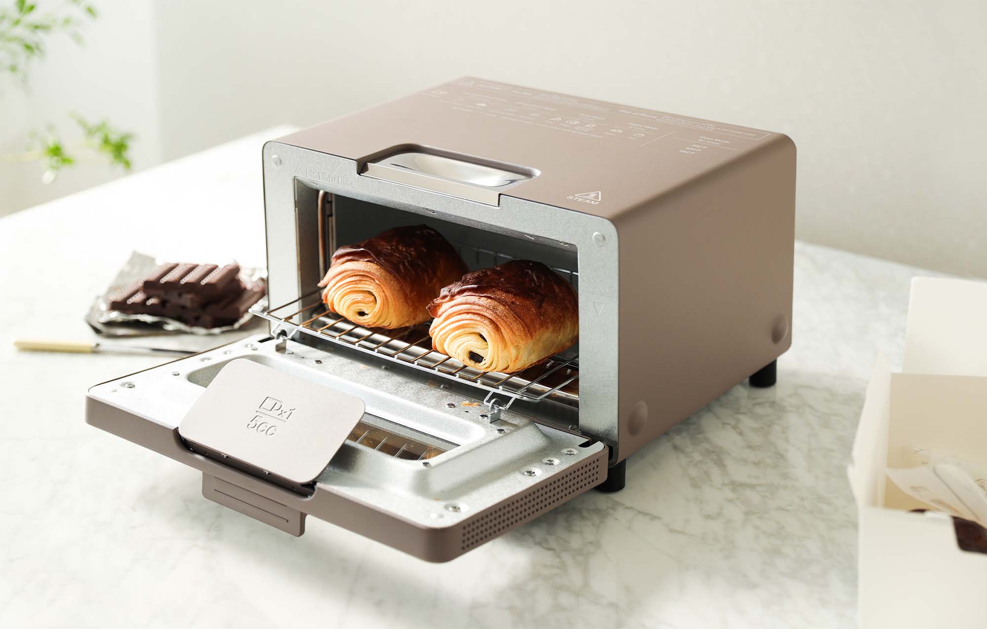 Toaster bakes bread while humidifying it - Japan Today